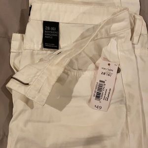 Distressed white boyfriend jeans